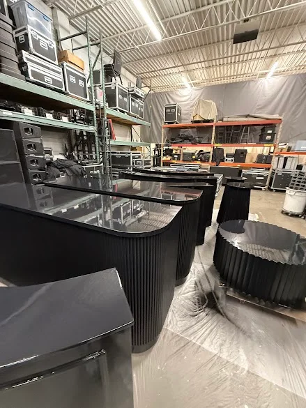 Custom black fluted fixtures with a smooth spray finish by Andy's Painting LLC